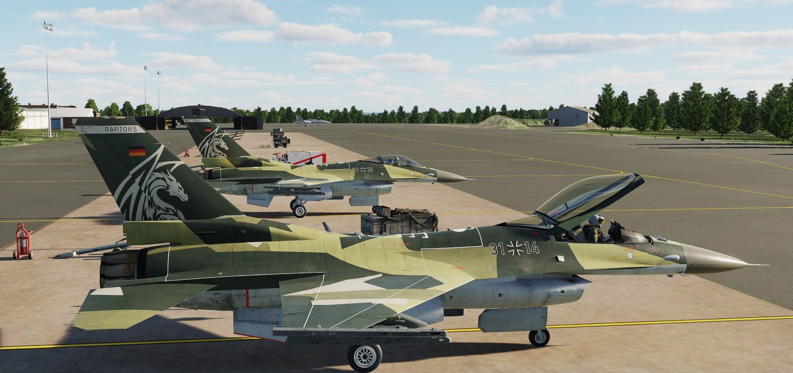 Camouflaged German F-16 aircraft lined up on an airbase apron