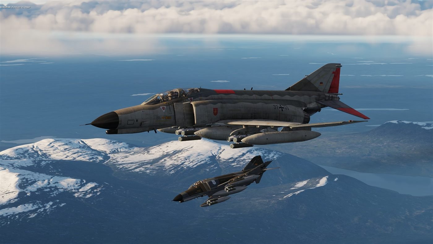 F-4E formation above the clouds