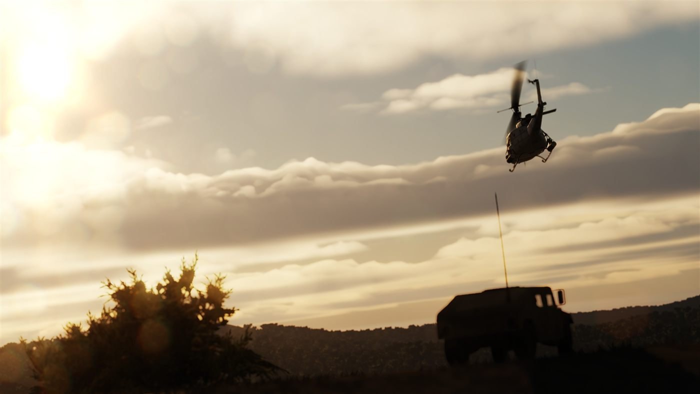 External-load flight at sunset